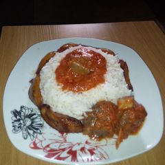 A picture of White rice,Goat meat stew and Dodo.