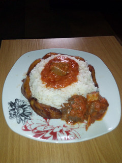 A picture of White rice,Goat meat stew and Dodo.