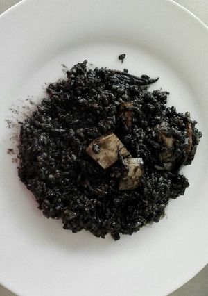 Una foto de Arroz negro con sepia