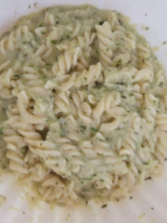 A picture of Pasta with zucchini pesto.
