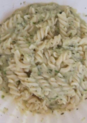 A picture of Pasta with zucchini pesto.
