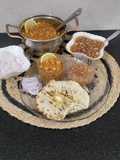 Chur Chur Naan Thali Chole Imli pyaaz chutney laccha pyaaz Chur chur Naan (Punjabi Dinner Thali)