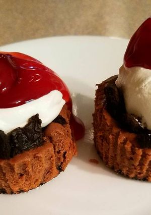 A picture of Black Forest Cheesecake Cupcakes.