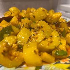 A picture of Bengali style zucchini curry.