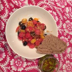 A picture of Tuna and fancy tomatoes.
