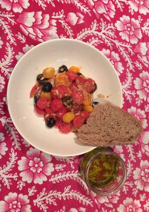 A picture of Tuna and fancy tomatoes.