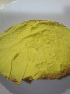 Una foto de Manteca colorada