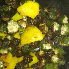 A picture of Potatoes and lady's finger stir fry.