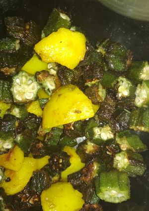 A picture of Potatoes and lady's finger stir fry.