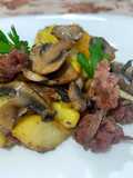 Potatoes with Tropea Onions, Sausage, and Champignon Mushrooms