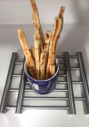 A picture of Garlic bread sticks.