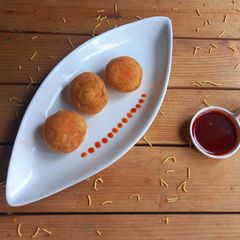 A picture of Dryfruit Kachori with Spicy Stuffed Masala.