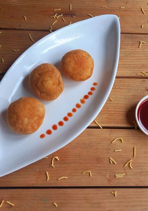A picture of Dryfruit Kachori with Spicy Stuffed Masala.