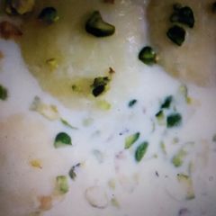 A picture of Rasmalai recipe with milk.