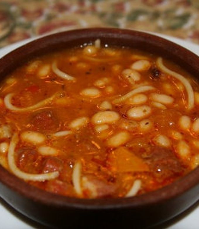 Una foto de Porotos con rienda y longaniza