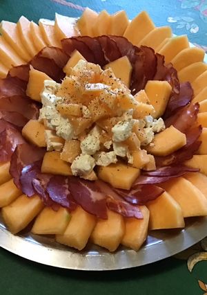 A picture of Sunny Melon Salad with Feta, Lomo, and Sichuan Pepper.