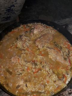 Una foto de Arroz con pollo al disco