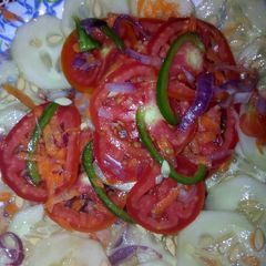 A picture of Ukwaju tomato salad.