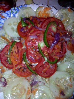 A picture of Ukwaju tomato salad.