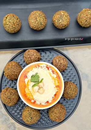A picture of Falafel and hummus.