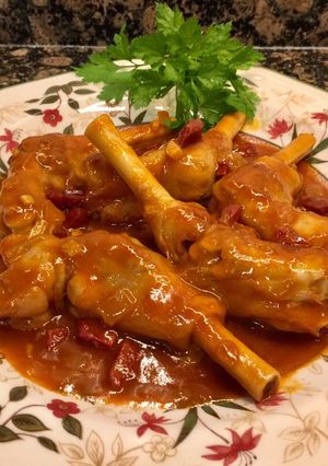 Foto principal de Manitas de cordero en salsa picante