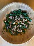 Dandelion salad with pomegranate molasses dressing