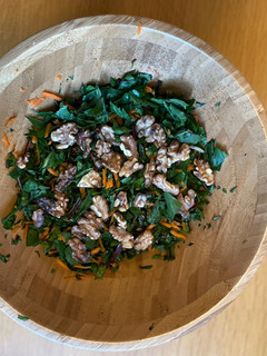 A picture of Dandelion salad with pomegranate molasses dressing.