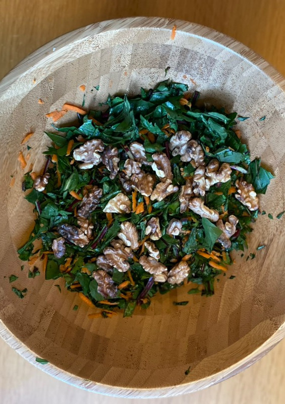 A picture of Dandelion salad with pomegranate molasses dressing.