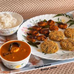 A picture of Seafood Platter – Mom Special ❤️(Prawns Curry, Fish Cutlet, Fish Fry & Steamed Basmati Rice).