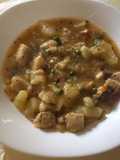 Caella con patatas en salsa