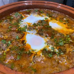 A picture of Kefta Mkaouara – Moroccan lamb and egg tagine.