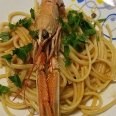 A picture of Linguine with Langostines in a tomato and brandy sauce 🎄.