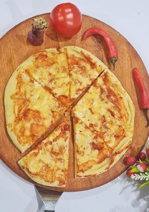 A picture of Margherita Pizza 🍕.