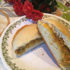 A picture of Chicken cheese bun.