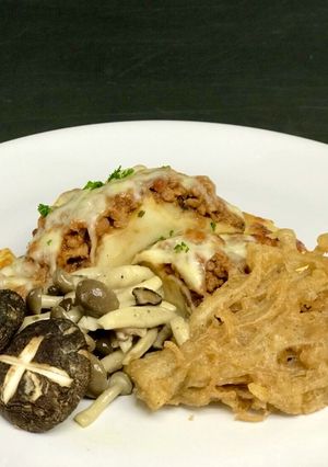 รูปของ Gratinated milky mushroom with bolognese sauce and assorted mushroom