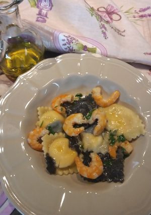 A picture of Spotted Ravioli Filled with Salmon Cream and Shrimp Sauce.