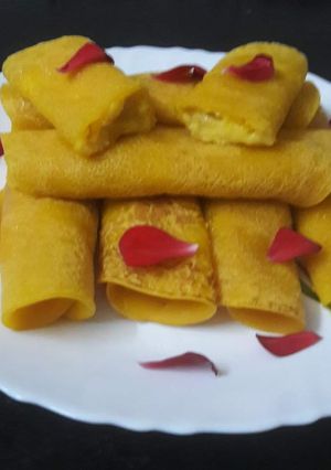 A picture of Mango pancakes stuffed with mango Rava/ Mango Patisapta(Bengali name).