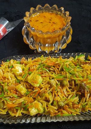 A picture of Pulao and rasa.