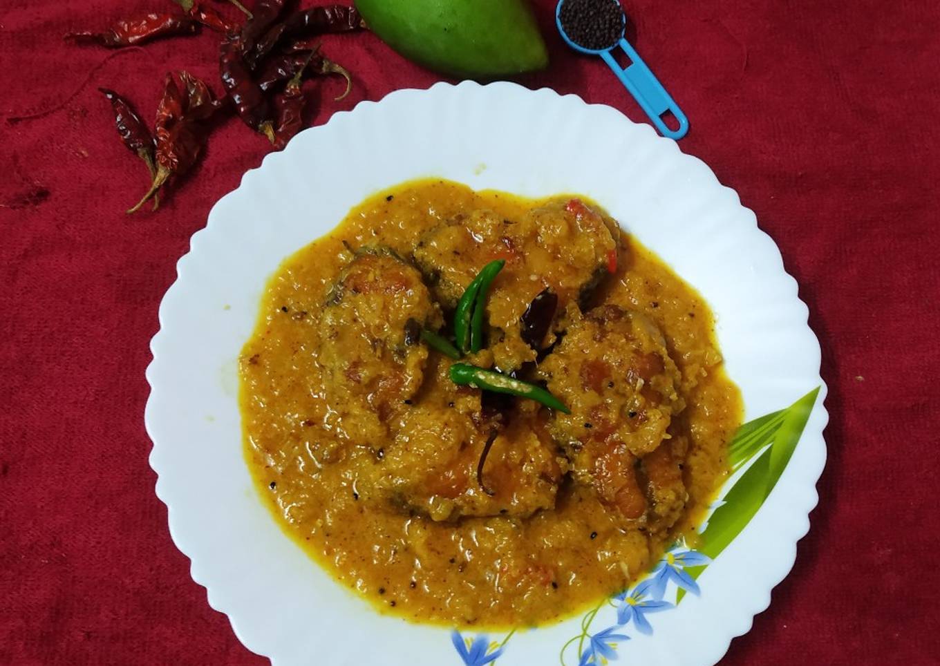 Rohu fish with raw mango