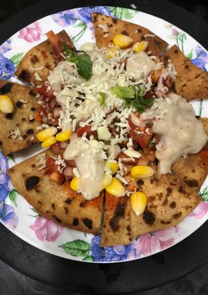 A picture of Nachos with Salsa.