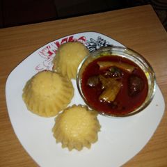 A picture of Eba muffin and Banga soup.