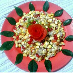 A picture of Corn pomegranate chat.
