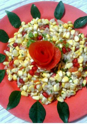 A picture of Corn pomegranate chat.