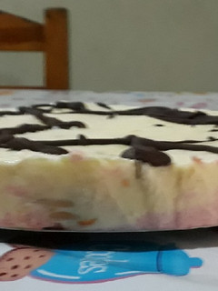 Una foto de Postre helado de Frutilla y Naranja.🍓🍊🍧