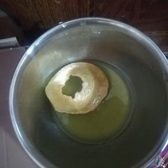 A picture of Sooji ke golgappas and meetha pani.
