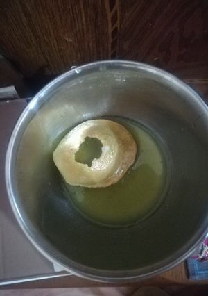 A picture of Sooji ke golgappas and meetha pani.