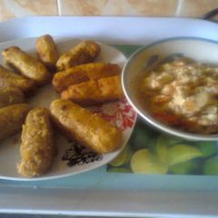 A picture of Yam/plantain sticks with egg sauce.
