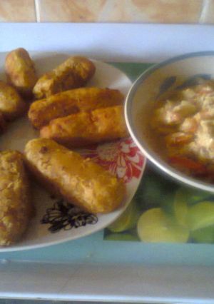 A picture of Yam/plantain sticks with egg sauce.