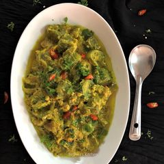 A picture of Jhinge Posto (Turai / Ridge Gourd in Poppy Seeds Gravy - Bengali Style).