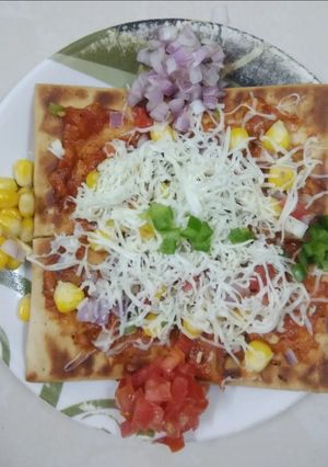 A picture of Corn Capsicum Pizza.